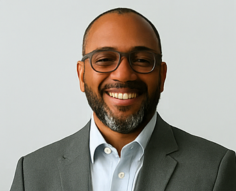 Professional confident lawyer with glasses and warm smile